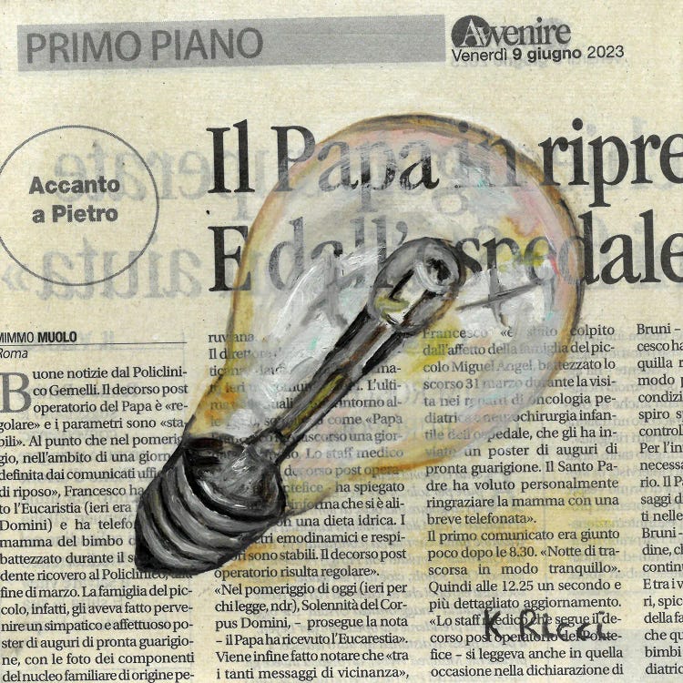 Light Bulb On Newspaper