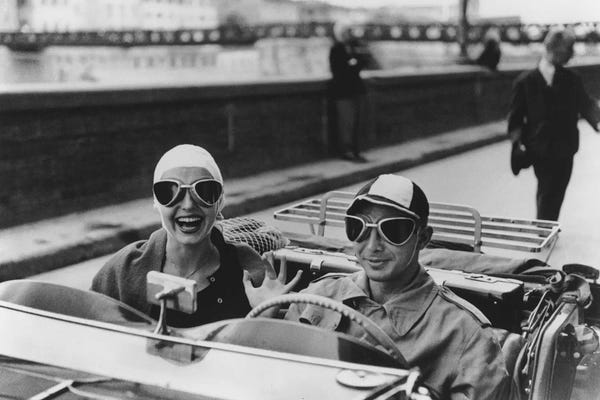 Romantic Bedroom (Love): Couple In Mg (Florence, Italy 1951) by Ruth Orkin