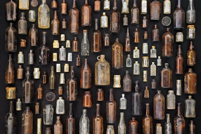 Brown And Clear Bottles by Barry Rosenthal metal wall art