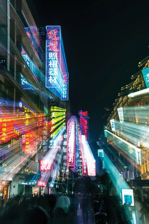 China, Shanghai. Nanjing Road, neon sign blur.