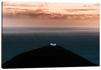 Lone House On A Hill Looking Over The Ocean Onto An Epic Sunset Canvas Art Print - Michael Schauer