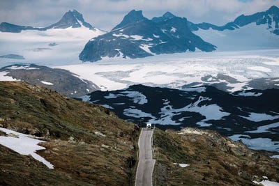 Caravan Traveling Along On A Mountain Road In Norway by Michael Schauer framed wall art