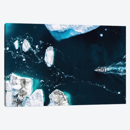 Small Boat Driving Through Huge Icebergs In Greenland Canvas Print #SCE148} by Michael Schauer Art Print