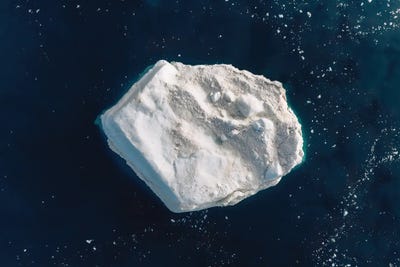Lone Iceberg In Greenland From Above by Michael Schauer framed wall art
