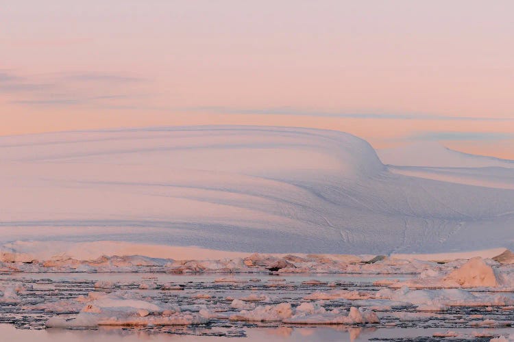 Smooth And Minimalist Iceberg In Greenland During Sunset