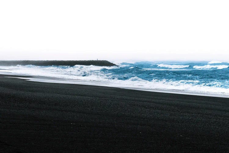 Waves Coming Onto The Black Sand Beach In Vík Iceland