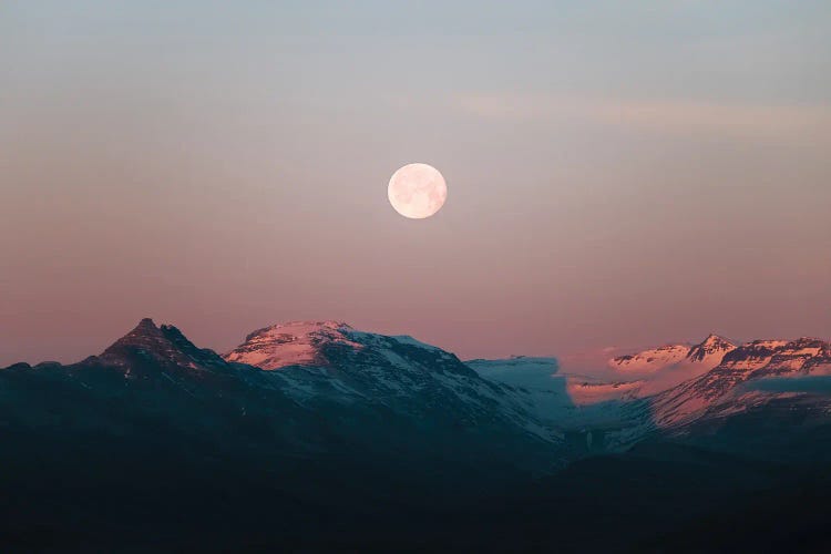 Moonrise Over Pink Mountains During A Calm Sunset In Iceland