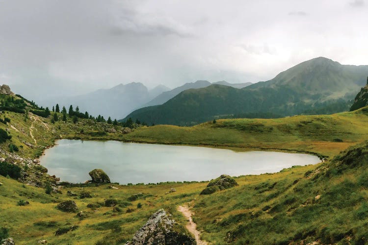 Calm Mountain Lake In The Dolomite Mountains