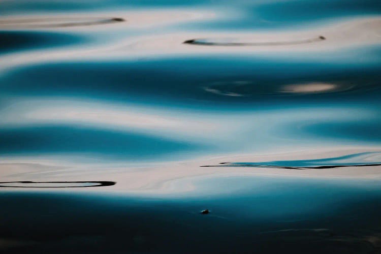 Abstract And Serene Ocean Surface At Sunset