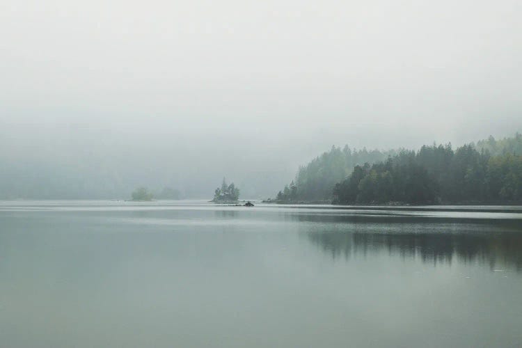 Minimalist Lake Reflection During A Foggy And Calm Morning