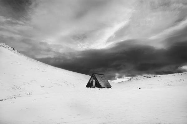 Minimalist Black And White Photo Of An A-Frame Cabin In Iceland