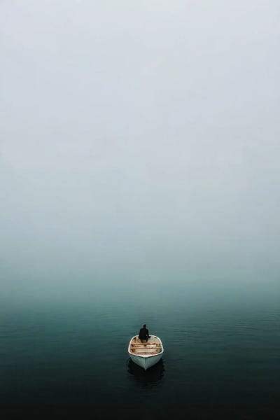 Michael Schauer: Lonely Person In A Boat At A Foggy Lake by Michael Schauer