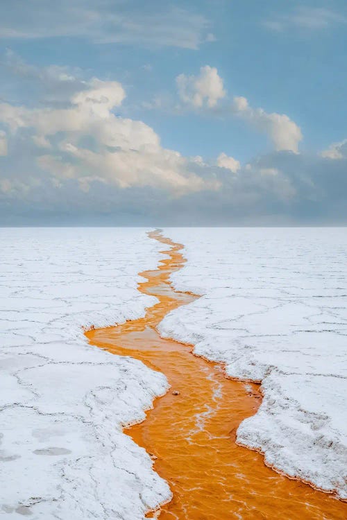 Minimalist Surreal Photograph Of A Salt Flat With An Orange River Flowing Towards The Horizon