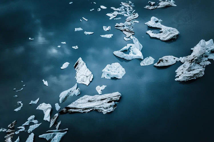 Icebergs Floating In Still Water In Iceland