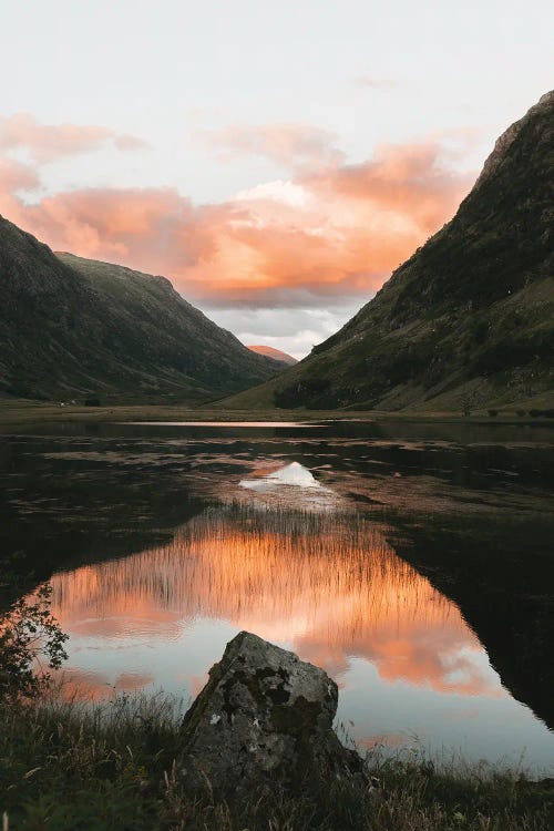 Perfect Reflection In A Mountain Lake In Scotland