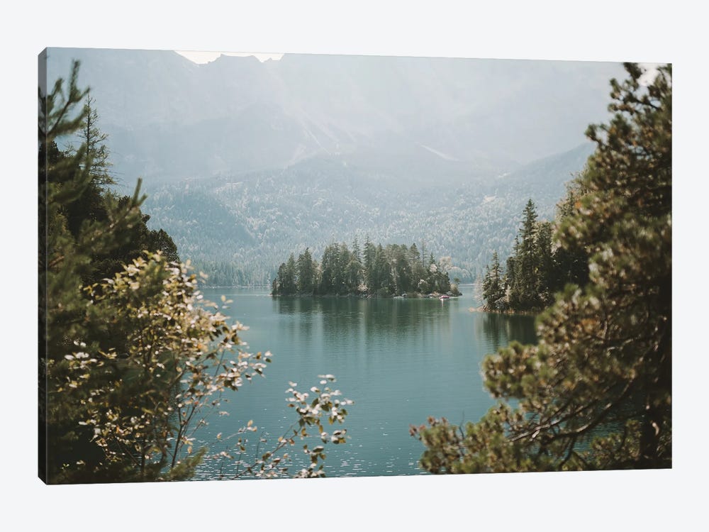 Forest Island In A Mountain Lake Framed By Trees On A Sunny And Hazy Day by Michael Schauer 1-piece Canvas Art Print