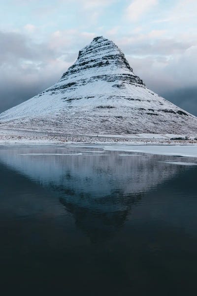 Kirkjufell Mountain In Iceland With Reflection On A Calm Morning