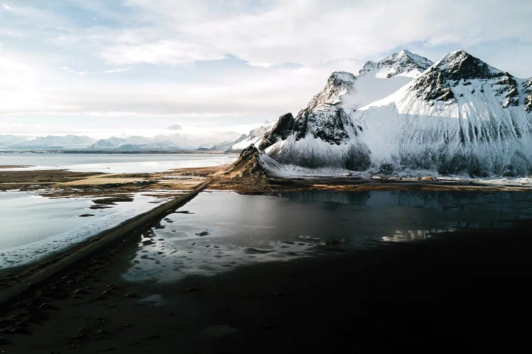 Stokksnes Mountain Peninsula On A Black Sand Beach Road During Sunset In Iceland