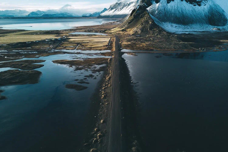 Stokksnes Mountain Peninsula On A Black Sand Beach Road During Sunset In Iceland