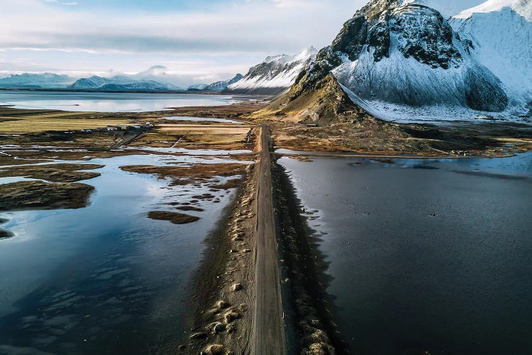 Stokksnes Mountain Peninsula On A Black Sand Beach Road During Sunset In Iceland