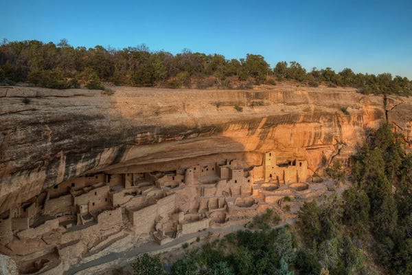 Ancient Ruins: Last Rays Over Cliff Palace At Mesa Verde by Bill Sherrell