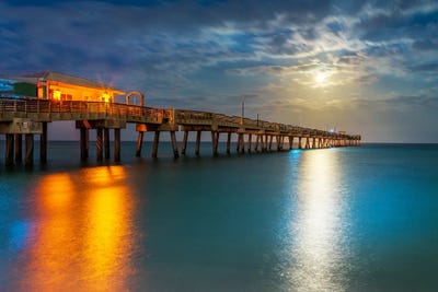 Full Moonrise At The Pier by Susanne Kremer canvas print