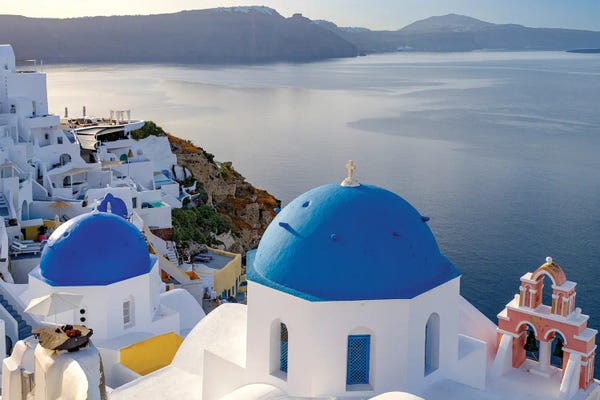 Famous Places Of Worship: Blue Domes And The Sea, Oia Santorini, Greece by Susanne Kremer