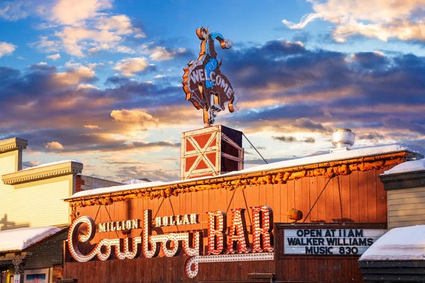 Signs: Rodeo Cowboy Bar At Sunset by Susanne Kremer