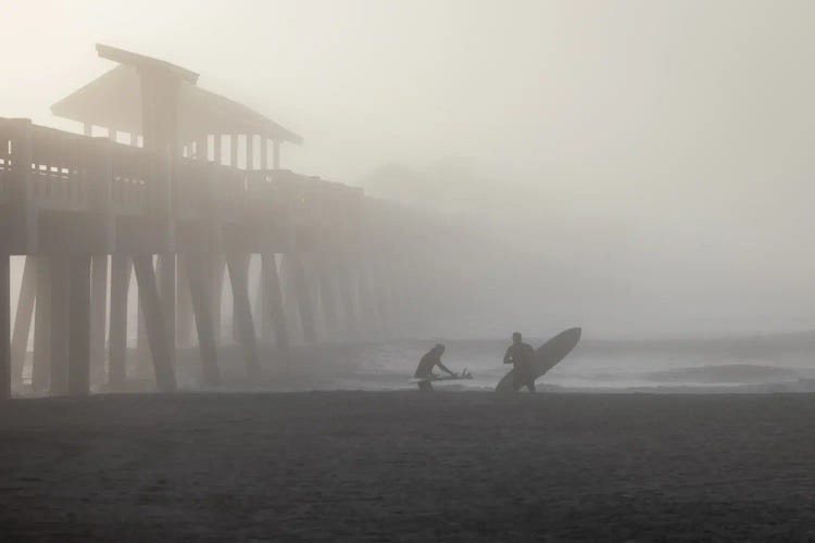 Surfers In Morning Fog Near Pier by Susan Richey wall art