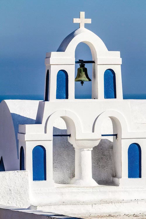 Oia, Greece. Greek Orthodox Church steeple by the Aegean Sea