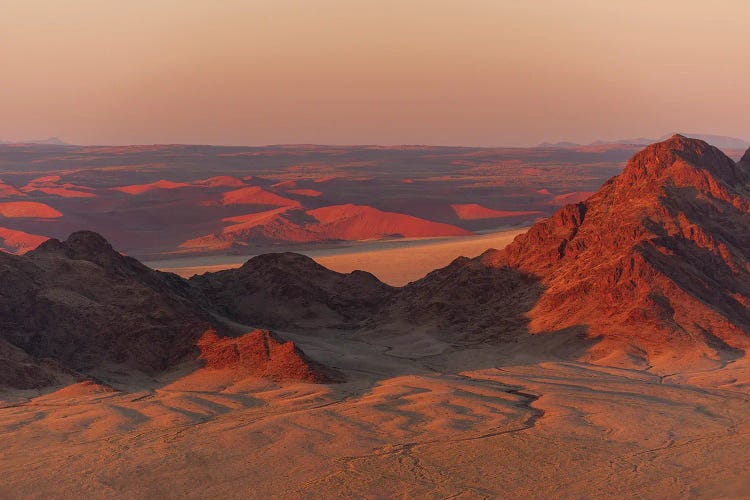 Light Illuminates The Naukluft Mountains And Namib Desert At Sunrise. Namib Naukluft Park, Namibia.