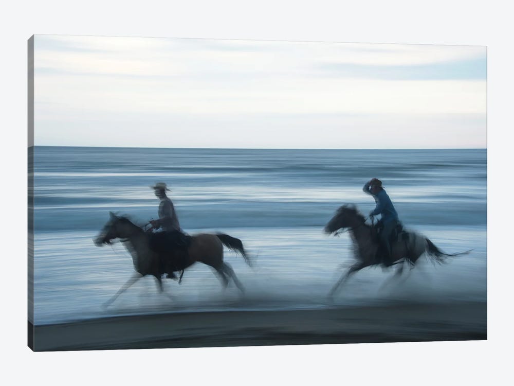 Two Cowboys Ride Horses Through The Waves On Virginia Beach, Virginia by Joel Sartore 1-piece Canvas Art Print