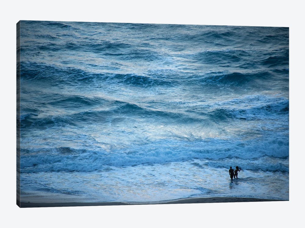 A Couple Plays In The Ocean Waves At Dusk At Riviera Beach by Joel Sartore 1-piece Canvas Art Print