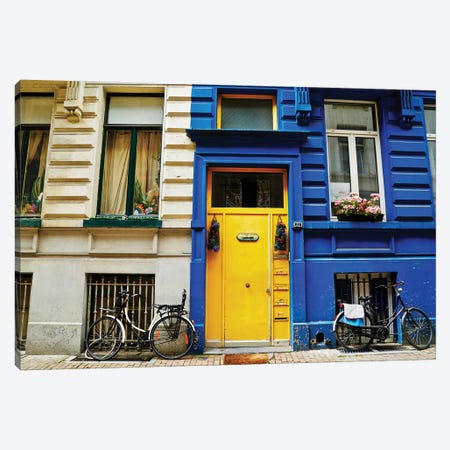 Yellow Door With Bikes Canvas Print #SUV301} by Susan Vizvary Canvas Wall Art