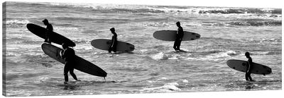 5 Surfers In Black And White Canvas Art Print - Susan Vizvary