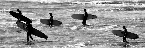 Susan Vizvary: 5 Surfers In Black And White by Susan Vizvary