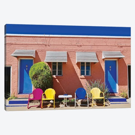 Motel Doors And Chairs Canvas Print #SUV64} by Susan Vizvary Art Print