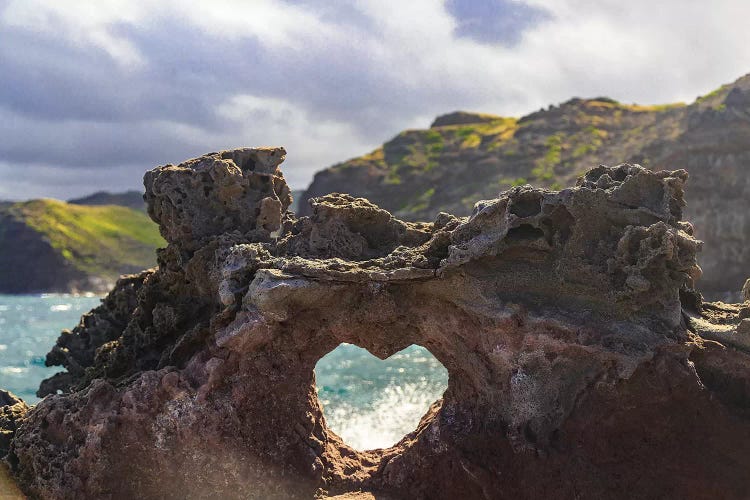 Heart-shaped opening near Nakalele Blowhole, northern tip of Maui, Hawaii