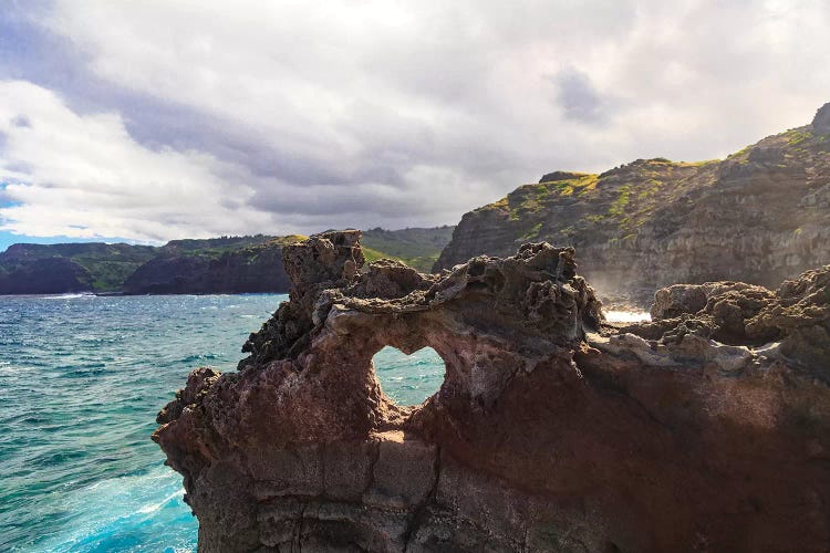 Heart-shaped opening near Nakalele Blowhole, northern tip of Maui, Hawaii