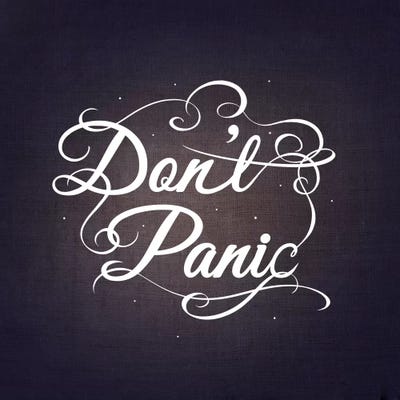 Don't Panic by 5by5collective framed canvas print