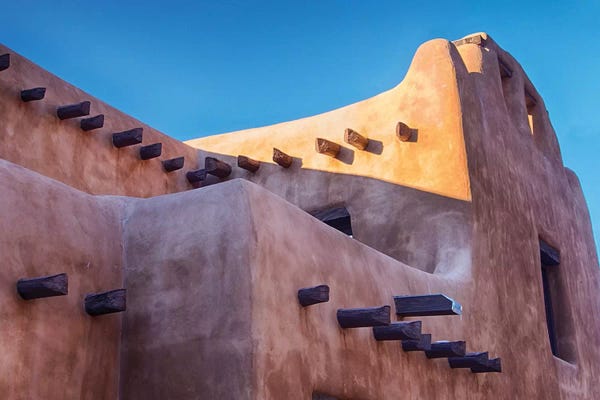 New Mexico: USA, New Mexico, Sant Fe, Adobe structure with protruding vigas and Snow by Terry Eggers