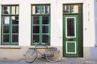 Belgium, Brugge. A bike against a brick wall in Bruges by Terry Eggers framed wall art