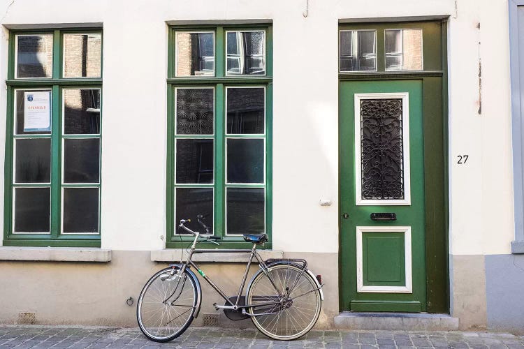 Belgium, Brugge. A bike against a brick wall in Bruges