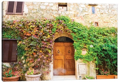 Typical house in Tuscan medieval village of Monteriggioni Canvas Art Print