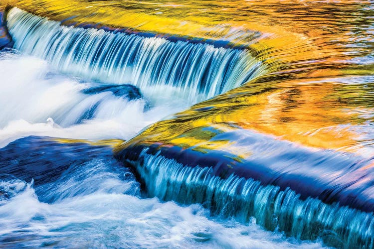 Michigan. Ottawa NF, smooth water reflecting fall foliage, Middle Branch of Ontonagon River