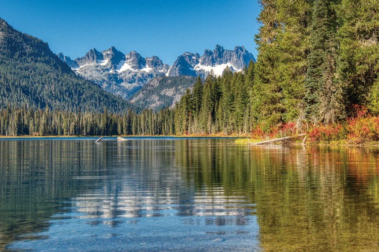 USA, Washington State. Cooper Lake in Central Washington, Cascade Mountains reflecting in calm waters.