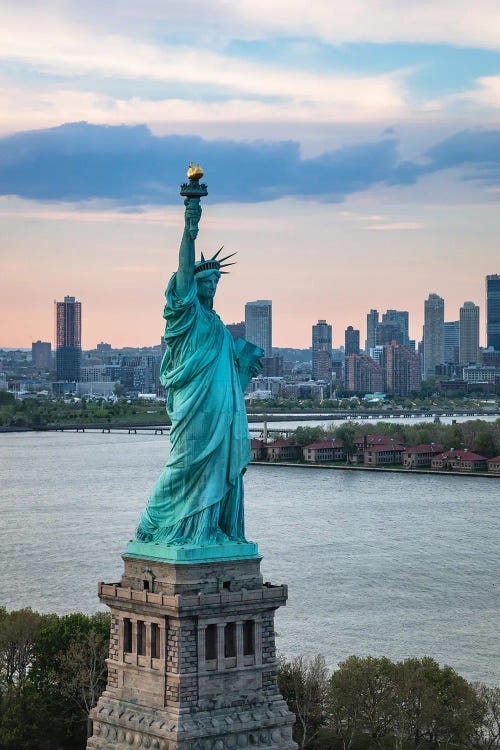 Aerial Of The Statue Of Liberty At Sunset, New York City