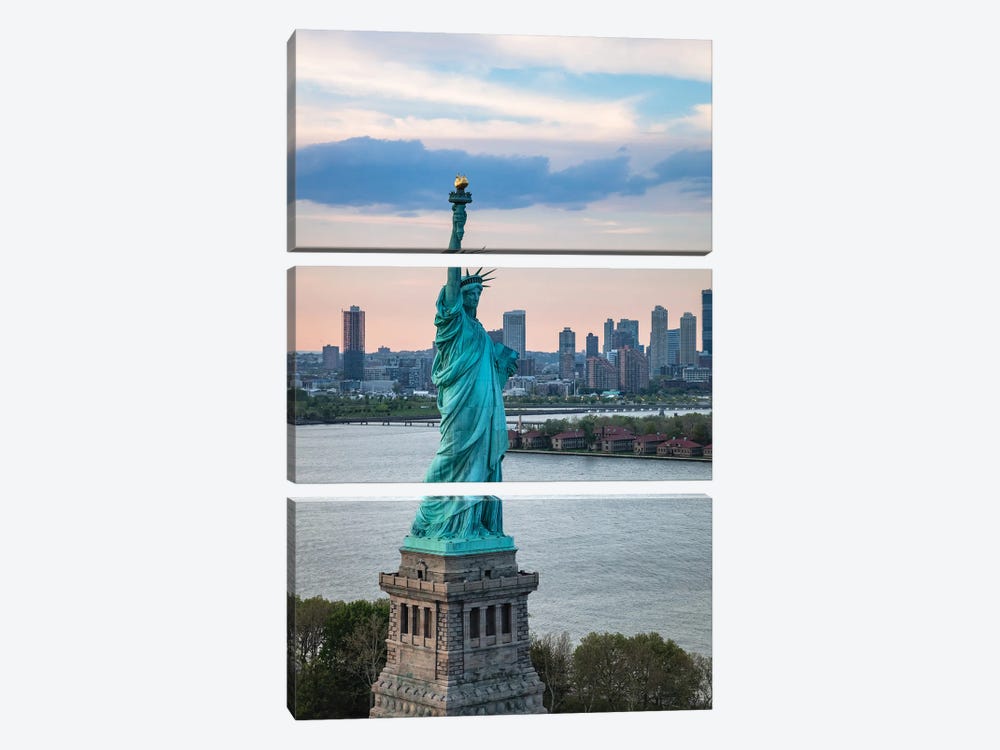 Aerial Of The Statue Of Liberty At Sunset, New York City by Matteo Colombo 3-piece Canvas Art Print