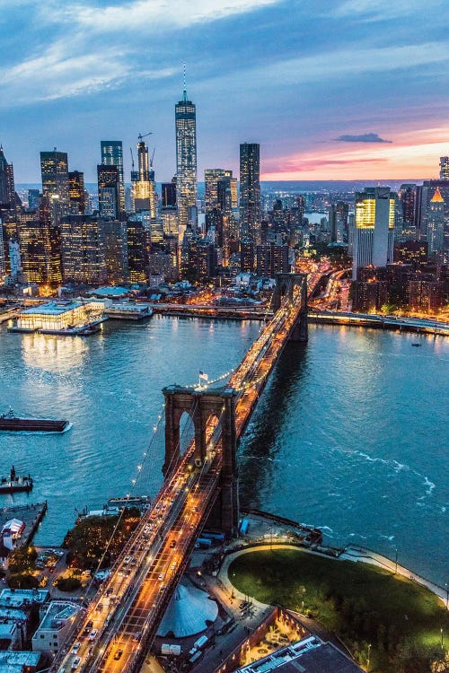 New York City Skyline And Brooklyn Bridge At Night