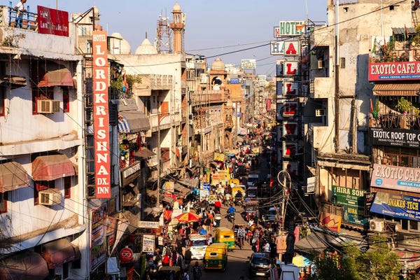 Delhi: Crowded Street At Sunset, Paharganj, Delhi, India by Matteo Colombo